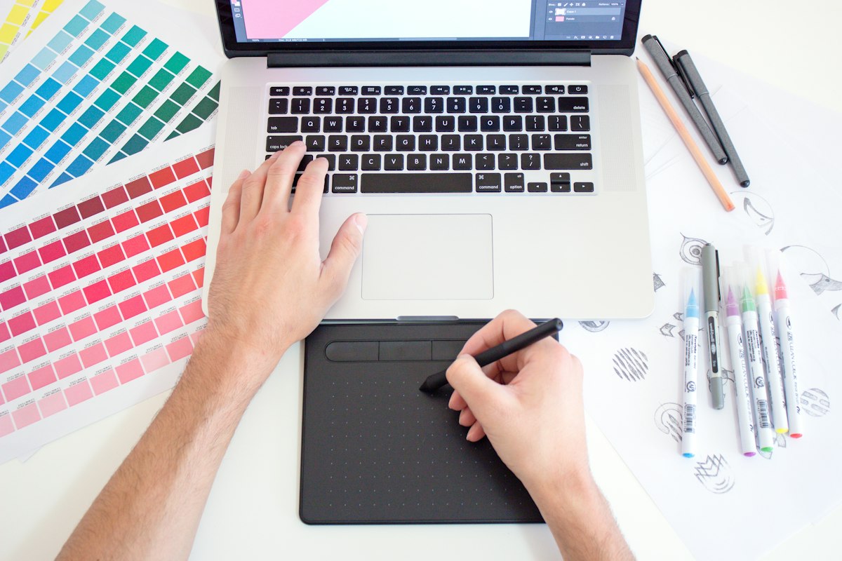 Graphic designer using a digital drawing tablet