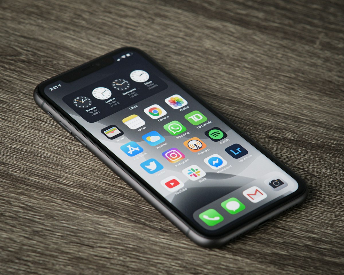 Smartphone with app icons for React Native mobile app development