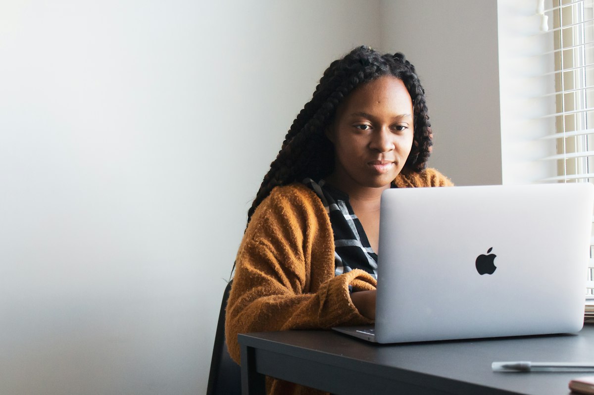 Web designer working on a laptop for a US small business website